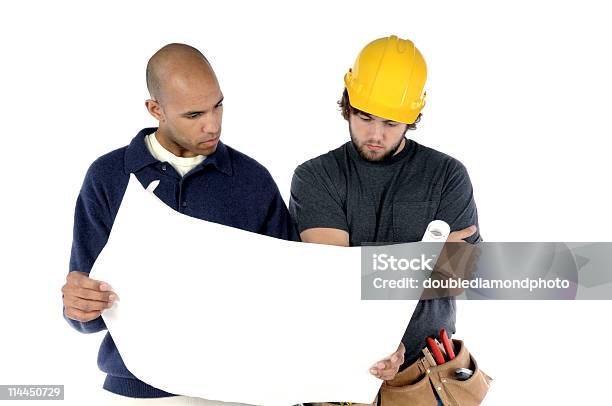 Reviewing The Plans Stock Photo - Download Image Now - Adult, Adults Only, Architect