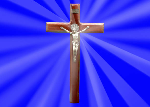 istock jesus on cross on blue background and white radius 1144507589