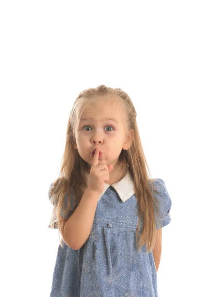 istock Little girl hold finger on lips 114450884