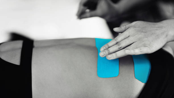 istock Back Treatment With Blue Kinesiology Tape 1144510806