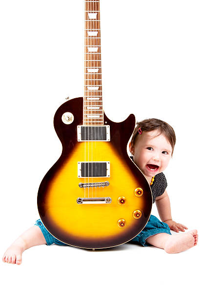 istock Little guitarist on a white background. 114451136