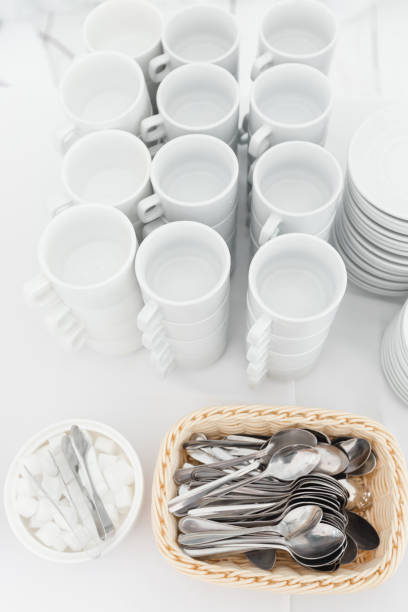 istock White ceramic mugs. Group of empty coffee cups. White cup for service tea or coffee in breakfast or buffet and seminar event. 1144516912