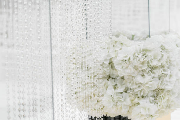 istock Crystal decorations for the wedding ceremony, luxurious decor. Beautiful arch decorated with chains with transparent beads 1144516991