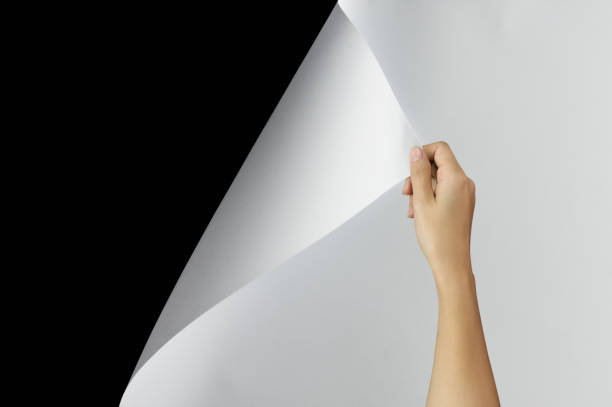 istock Woman hand turning page. 1144518539