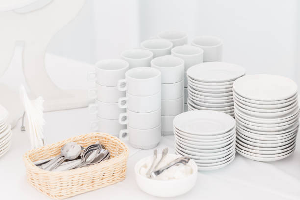 istock White ceramic mugs. Group of empty coffee cups. White cup for service tea or coffee in breakfast or buffet and seminar event. 1144518702