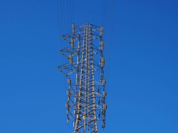 istock power lines and pylon over clear sky Tokyo,Japan 1144518754