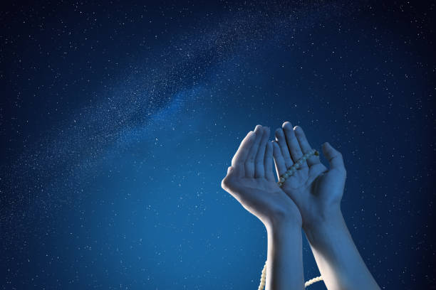 istock Muslim hands praying with prayer beads at outdoor 1144522169