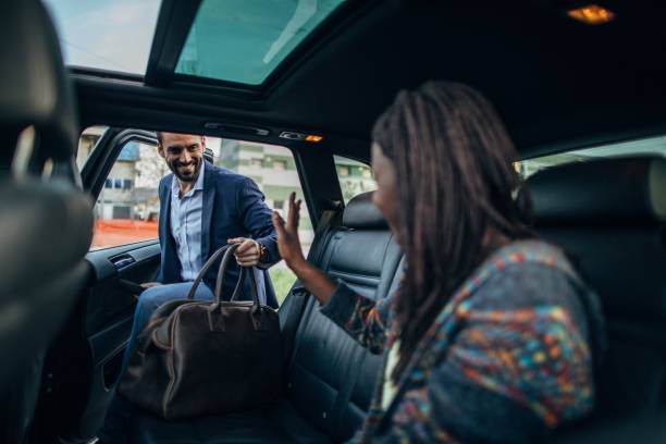 istock Gentleman entering a ride sharing car 1144522958