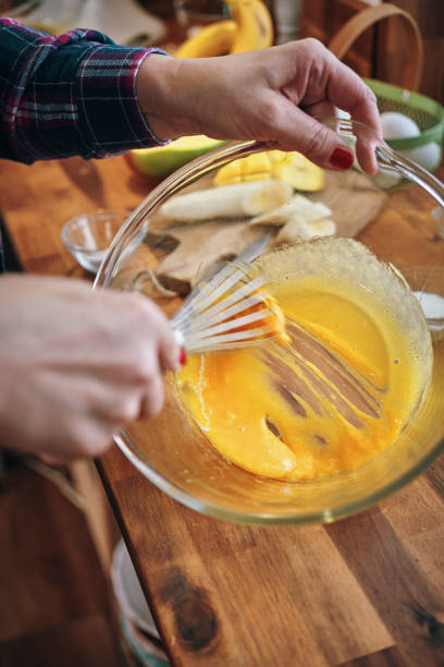 istock Preparing Mango Banana Souffle in Domestic Kitchen 1144523175