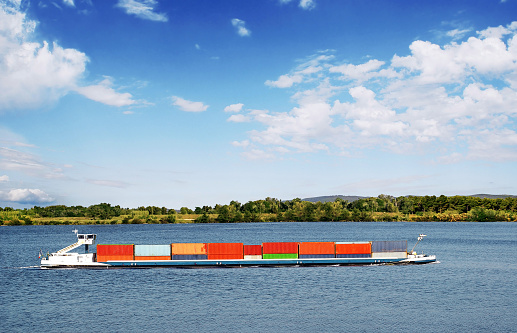 The Rhône is a major axis of river transport.\nBarge river transport carrying containers on rivers and canals\nis an environmentally friendly alternative to road transport because it consumes five times less fuel.
