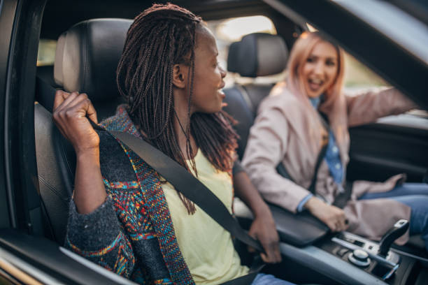 istock Girlfriends riding in a car in city 1144525704
