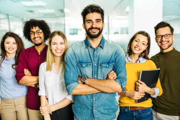 istock Happy and cheerful young students standing and looking at camera 1144527176