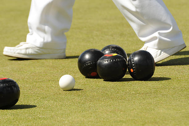 istock Four black English bowls and a white ball 114452774