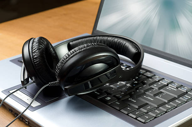 istock headphones and laptop 114452964