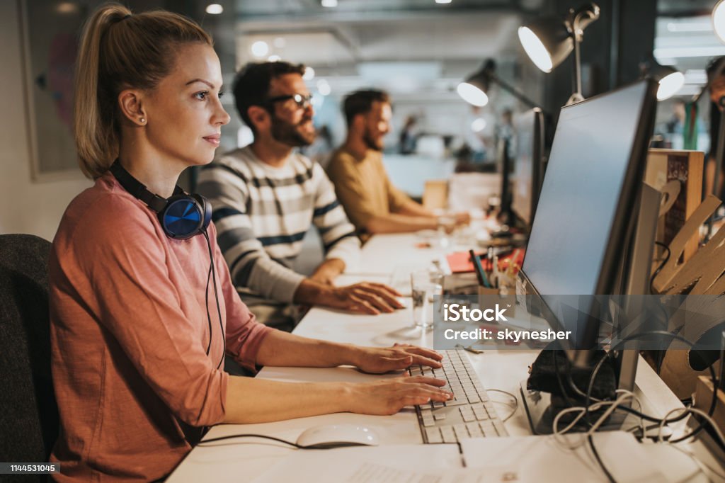 Programmmers Group Of Young Computer Programmers Working In The Office Stock Photo ...