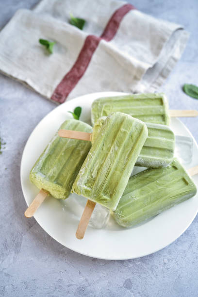 istock Preparing Green Tea Yogurt Ice Cream on Stick 1144531351