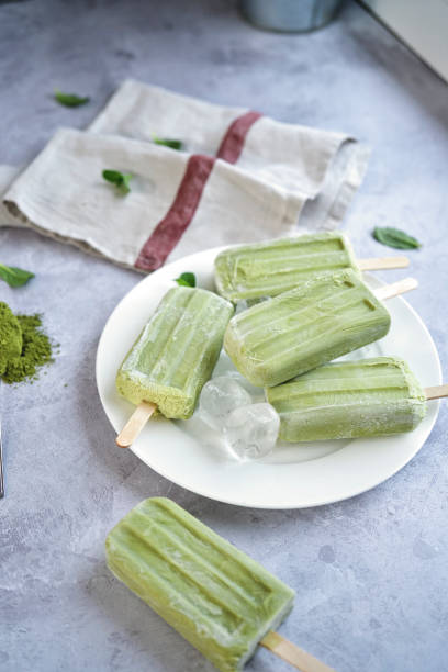 istock Preparing Green Tea Yogurt Ice Cream on Stick 1144531364