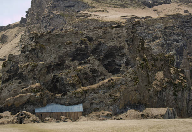 istock Big rock with barns of Drangshlid Farm 1144531477