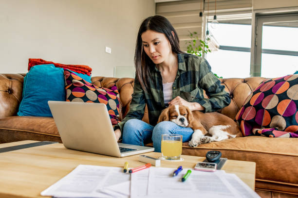 istock young woman working from home 1144532798