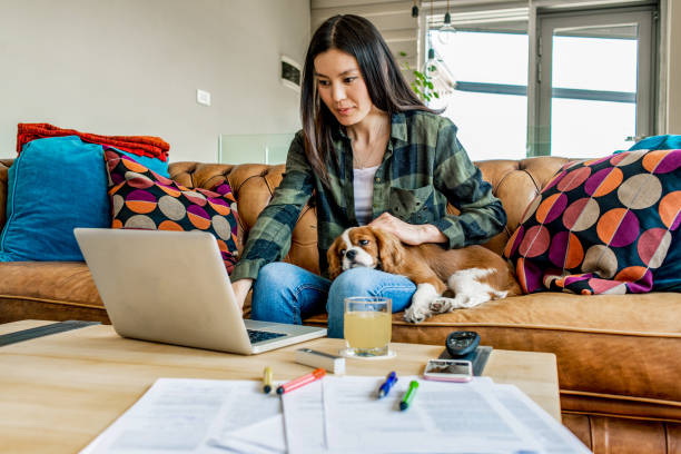 istock young woman working from home 1144532916