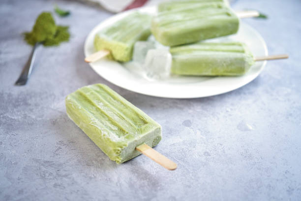 istock Preparing Green Tea Yogurt Ice Cream on Stick 1144533017