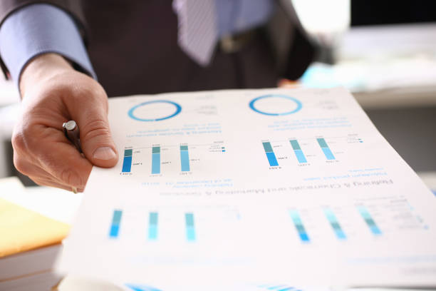 istock Auditor Calculating Tax Income Using Business Data 1144533028