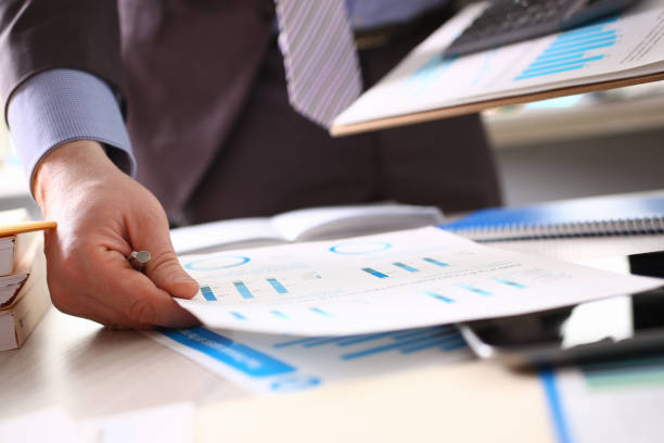 istock Accountant Calculate Tax Income Using Calculator 1144533032