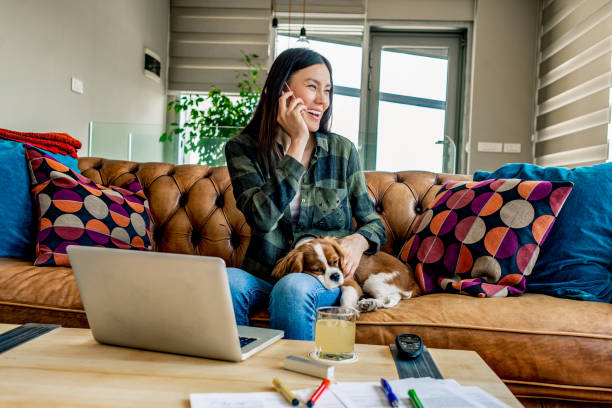istock young woman working from home 1144533150