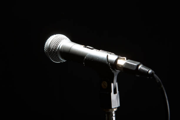istock Microphone isolated on black background. Music and concert concept. 1144533176