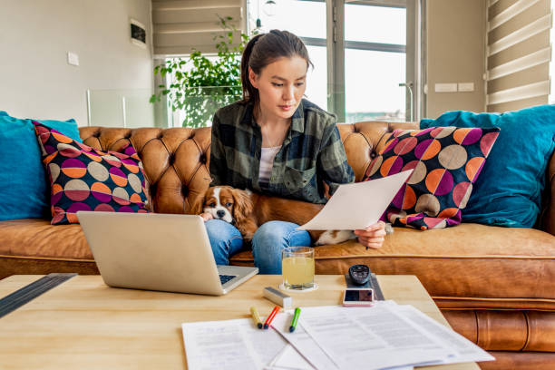 istock young woman working from home 1144533451