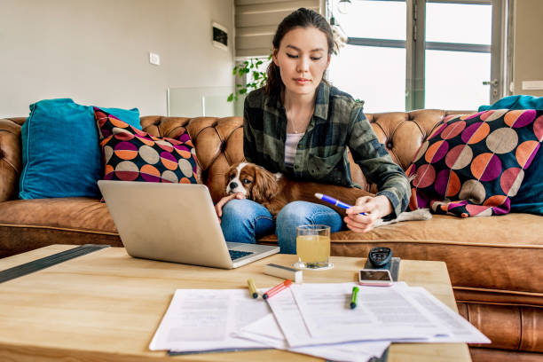 istock young woman working from home 1144533623