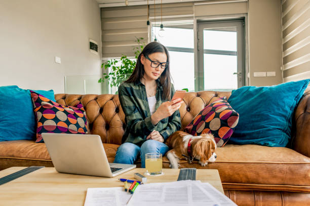 istock young woman working from home 1144534926