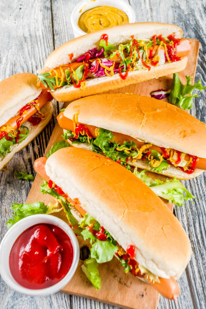 istock Homemade hot dogs with sauces 1144535560