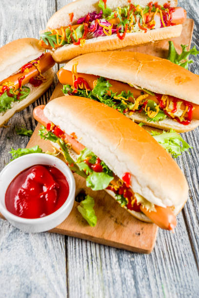 istock Homemade hot dogs with sauces 1144535568