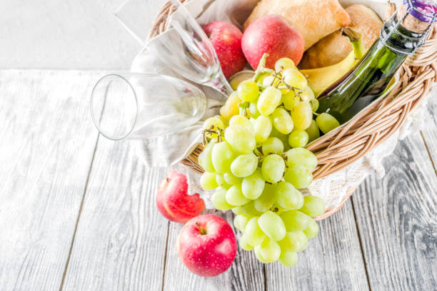 istock Picnic basket with fruit bread and wine 1144535585