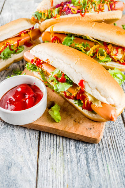 istock Homemade hot dogs with sauces 1144535601