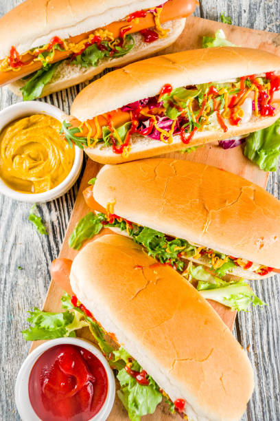 istock Homemade hot dogs with sauces 1144535611