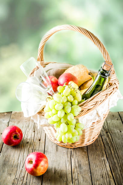 istock Picnic basket with fruit bread and wine 1144535614
