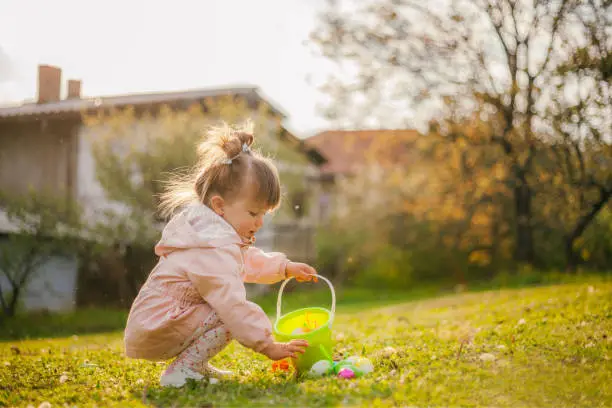 Photo of Playing on the lawn next to the house during the Easter