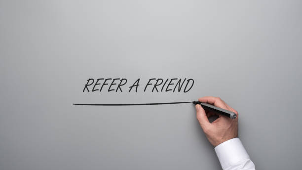 istock Refer a friend sign 1144536282
