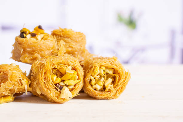 istock Lebanese baklava nest with kitchen behind 1144537029
