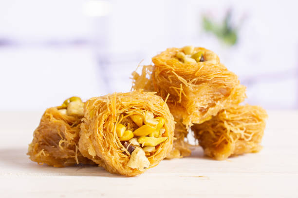 istock Lebanese baklava nest with kitchen behind 1144537088