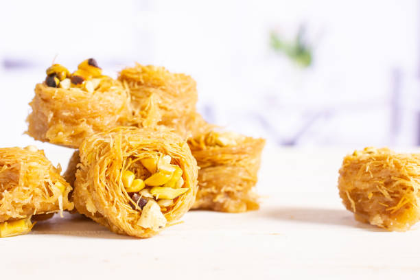 istock Lebanese baklava nest with kitchen behind 1144537181