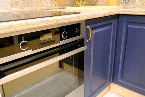 istock kitchen module. Light grey handle on the front of the Cabinet. Furniture accessories. 1144539336