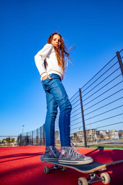 istock Low angle view of a Little Skateboarder 1144539714
