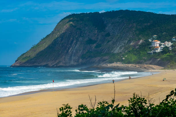 istock Stone beach and mountain. Beach paradise. 1144541860