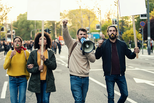 Young Protesters Protesting at the street