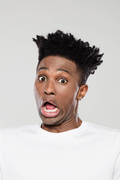 istock Afro american man looking shocked 1144545532