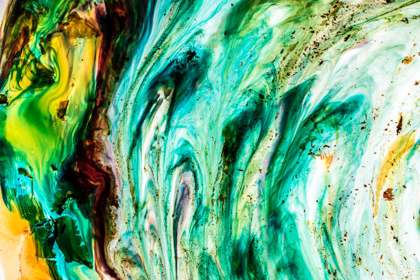 istock Background of blue, green, yellow, red ink waves 1144545826