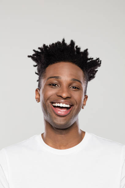 istock Handsome afro american man smiling at camera 1144546183
